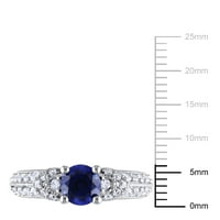 Miaенски Miabella 1. Carat T.G.W. Тркалезно создадено сино сафир и создаде бел сафир Стерлинг сребрен невестински прстен
