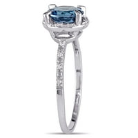 Miaенски Carat Carat T.G.W. Тркалезен лондонски сина топаз и дијамант акцент 10kt бело злато ореол невестински прстен