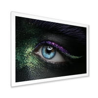 DesignArt „Womanените очи со модерно врамен уметнички принт на зелени и виолетови пигменти и искри“